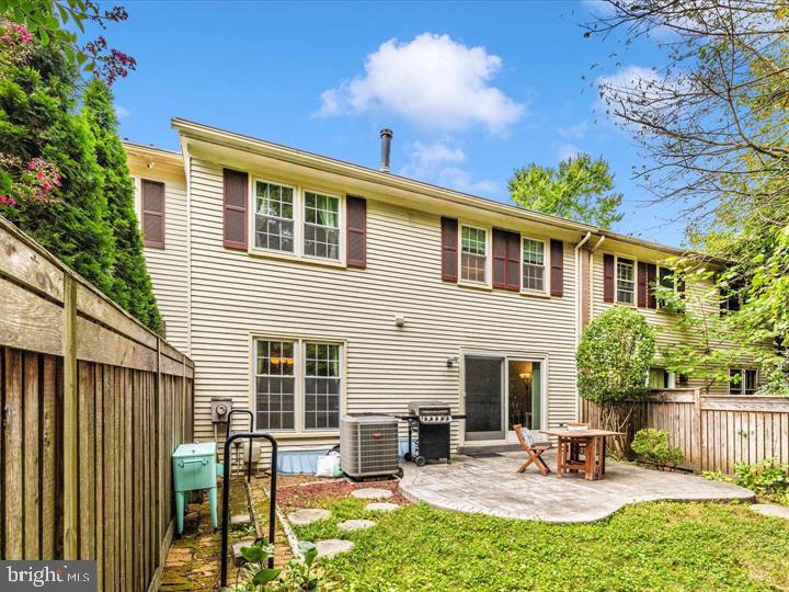 20105 Waringwood Way Gaithersburg, MD 20886 - Photo 28 of 39 a view of a house with backyard outdoor seating area and fire pit