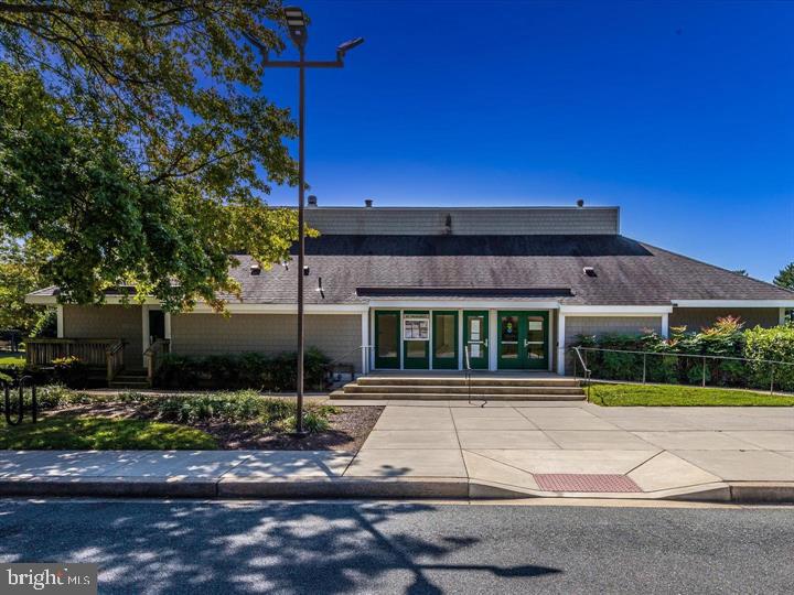 20105 Waringwood Way Gaithersburg, MD 20886 - Photo 35 of 39 a front view of a house with plants