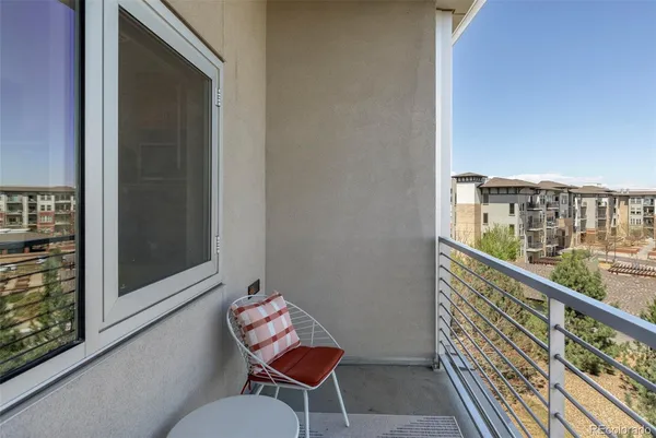 a view of a building with a bench
