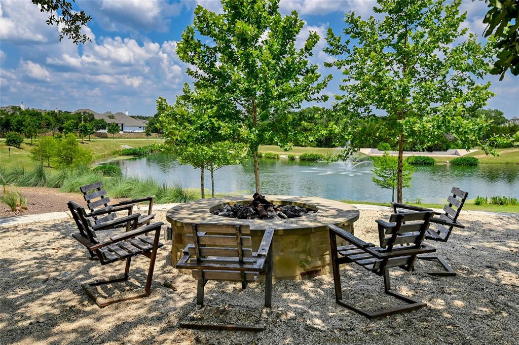 941 Rabbit Brush Road Leander, TX 78641 - Photo 29 of 29 Surrounding community with a patio area, a water view, and a fire pit