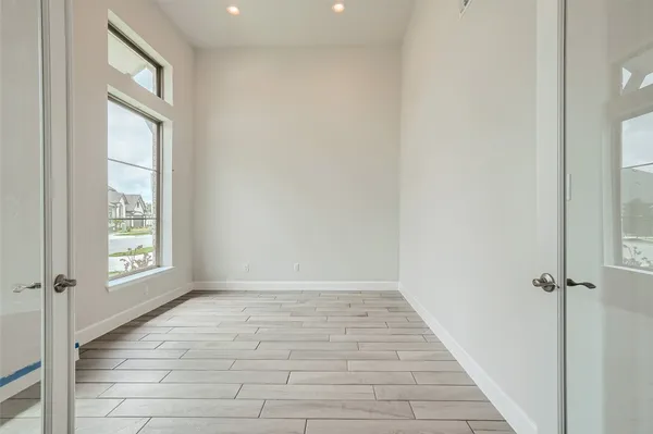 an empty room with windows