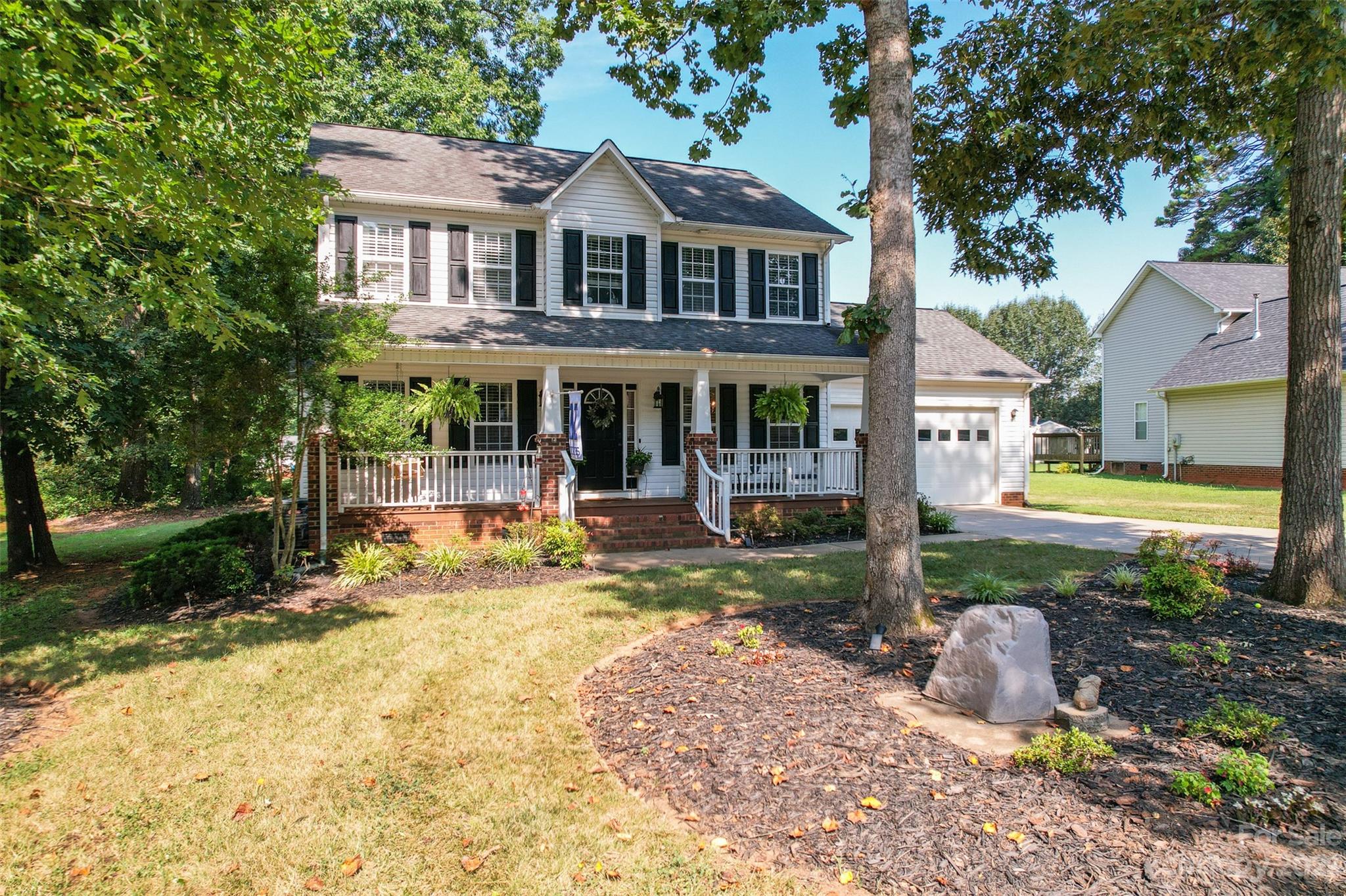 358 Maple Ridge Circle Salisbury, NC 28147 - Photo 1 of 48 a view of a house with backyard porch and sitting area