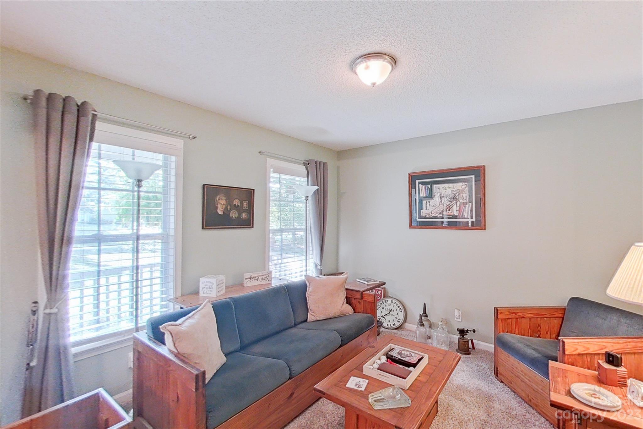 358 Maple Ridge Circle Salisbury, NC 28147 - Photo 14 of 48 a living room with furniture and a window