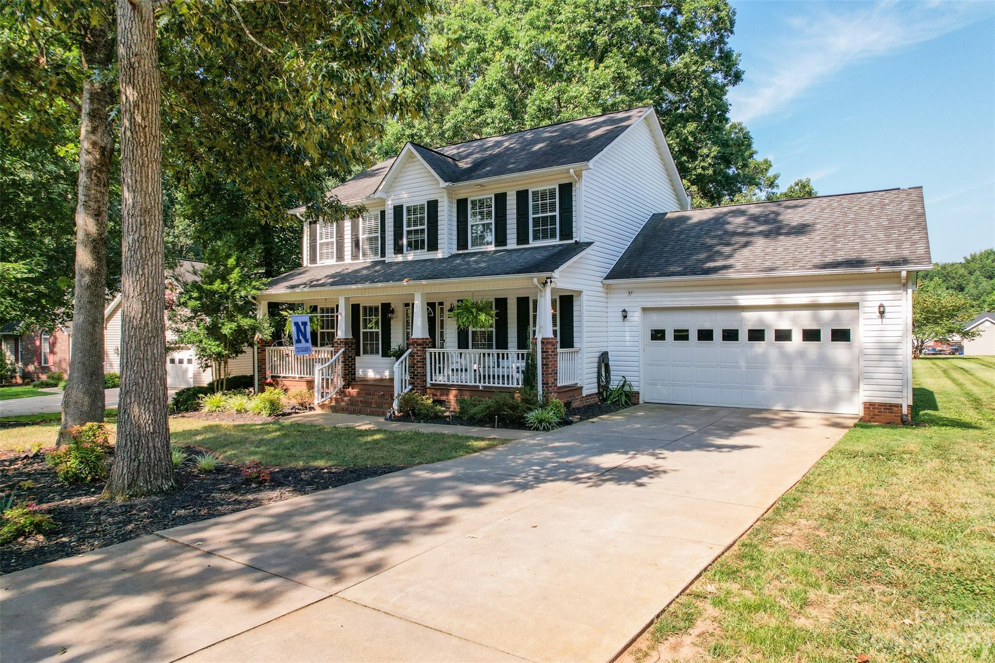 358 Maple Ridge Circle Salisbury, NC 28147 - Photo 2 of 48 a view of a yard in front of house