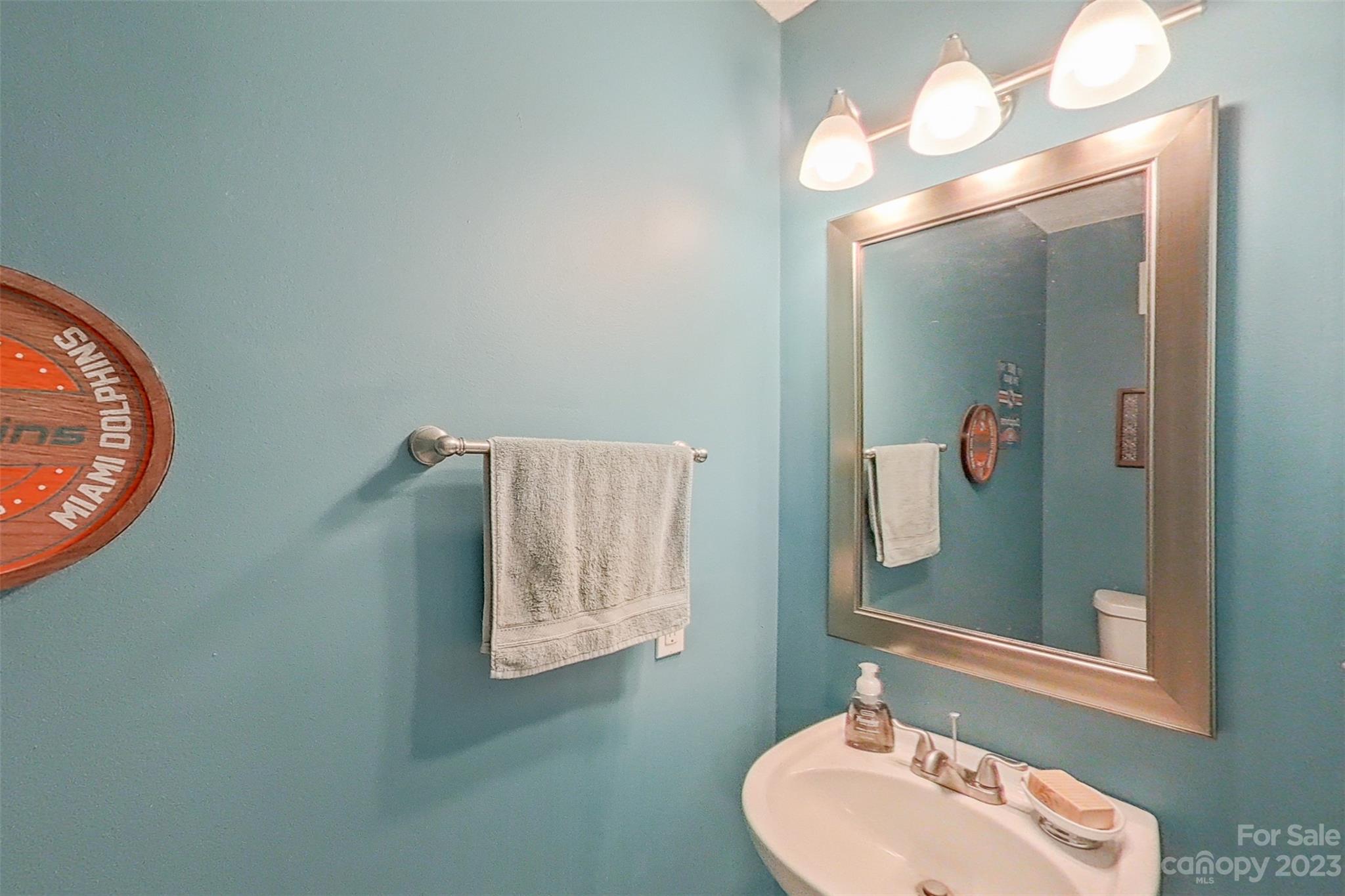 358 Maple Ridge Circle Salisbury, NC 28147 - Photo 25 of 48 a bathroom with a sink mirror and vanity