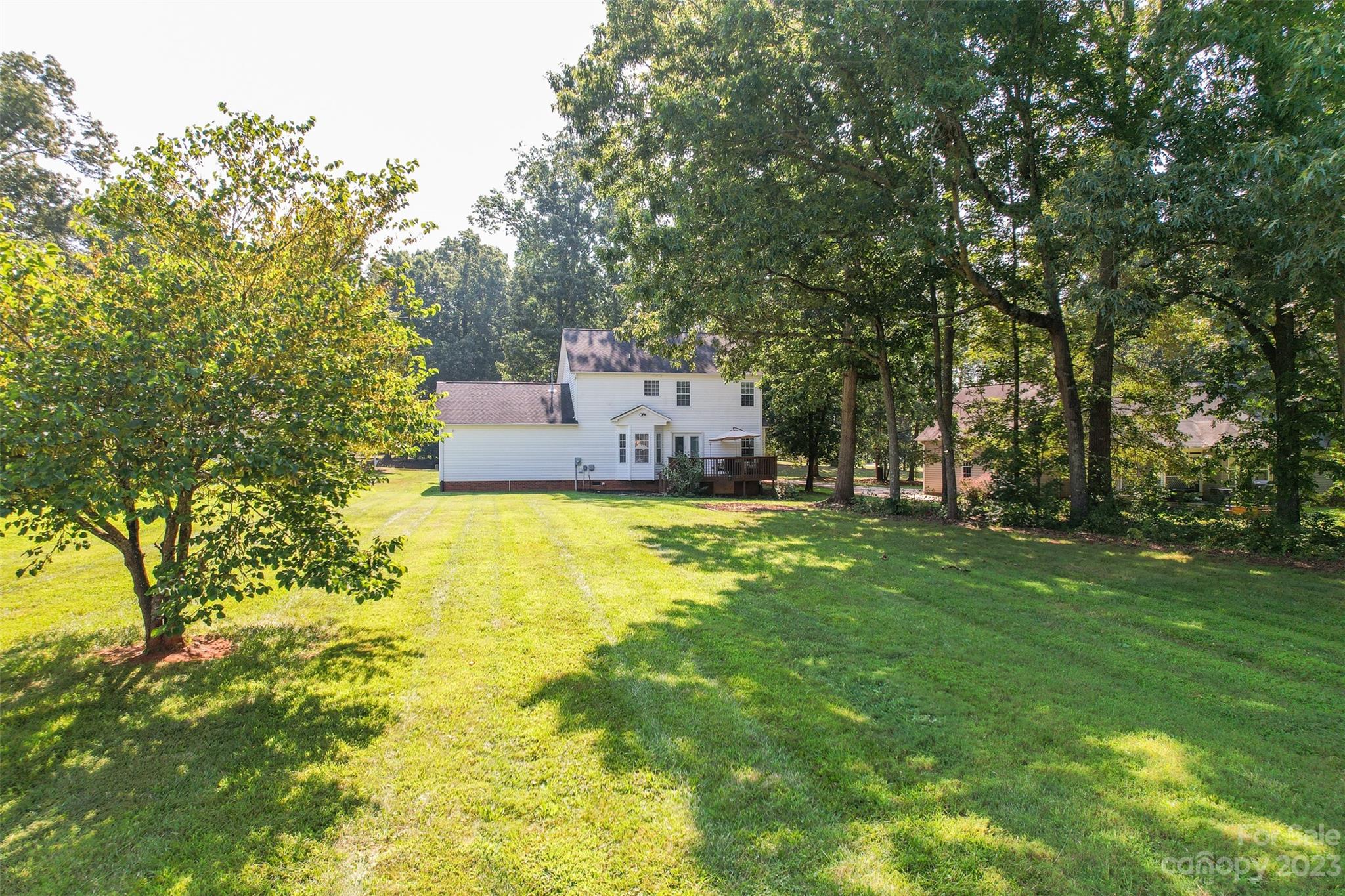 358 Maple Ridge Circle Salisbury, NC 28147 - Photo 40 of 48 a view of a house with a big yard