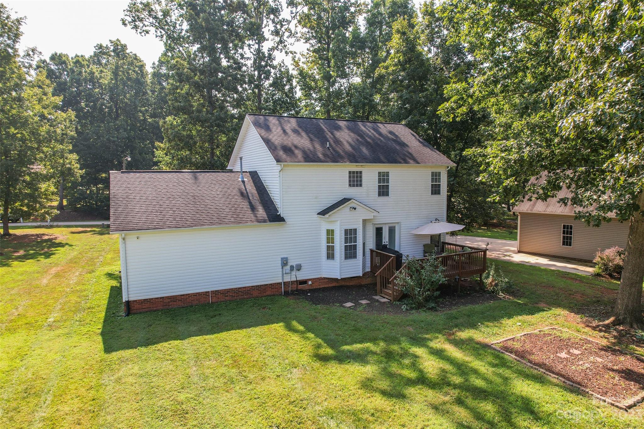 358 Maple Ridge Circle Salisbury, NC 28147 - Photo 44 of 48 an aerial view of a house with swimming pool and sitting area