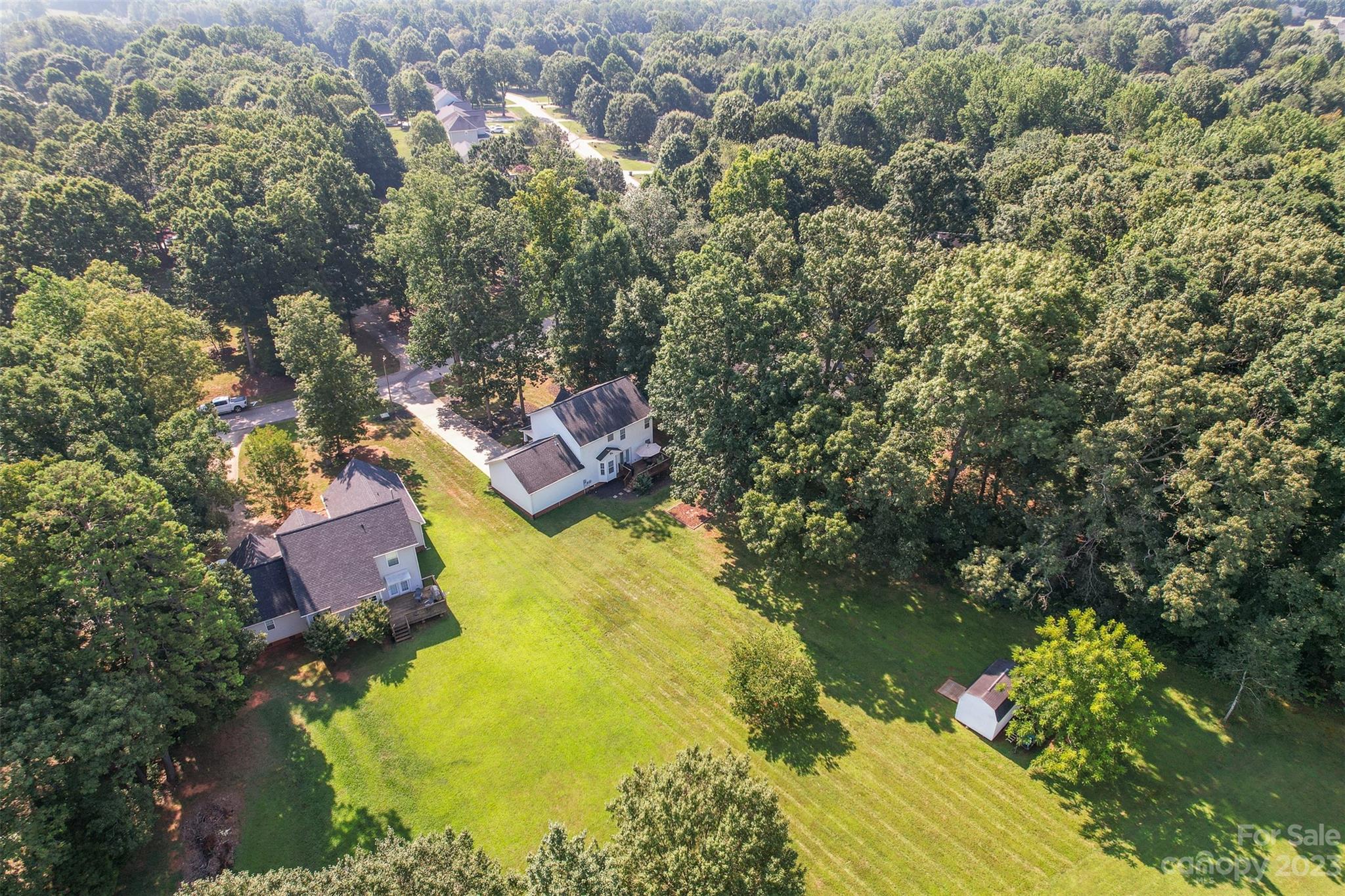358 Maple Ridge Circle Salisbury, NC 28147 - Photo 45 of 48 an aerial view of residential houses with outdoor space and swimming pool