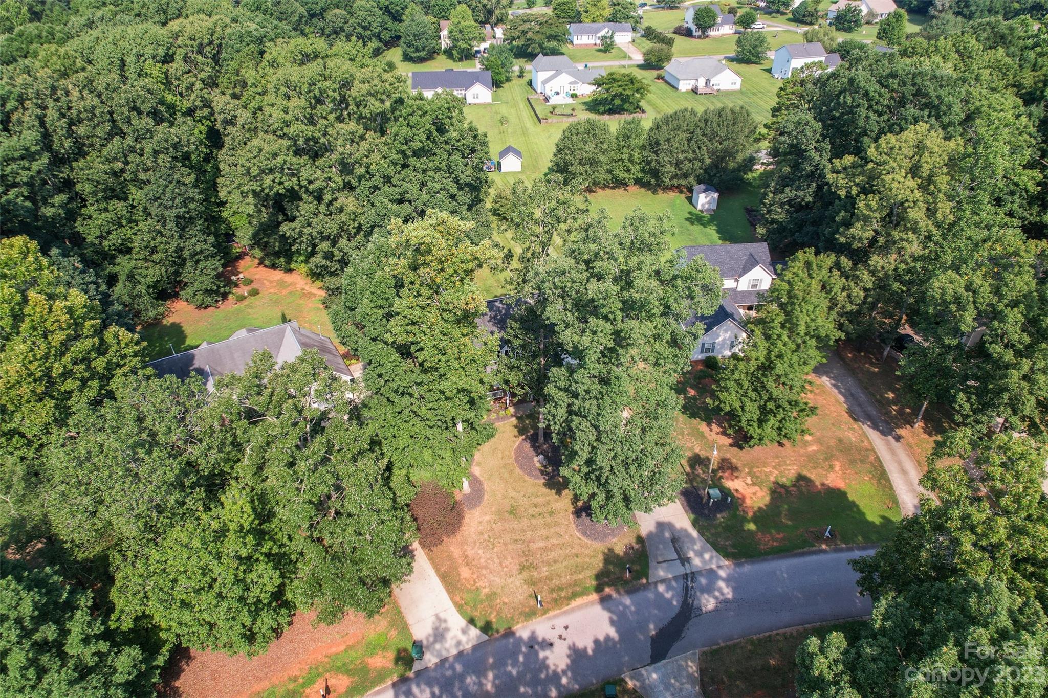 358 Maple Ridge Circle Salisbury, NC 28147 - Photo 6 of 48 an aerial view of a house with a yard and lake view