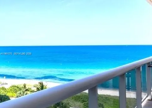 a view of an ocean from a balcony