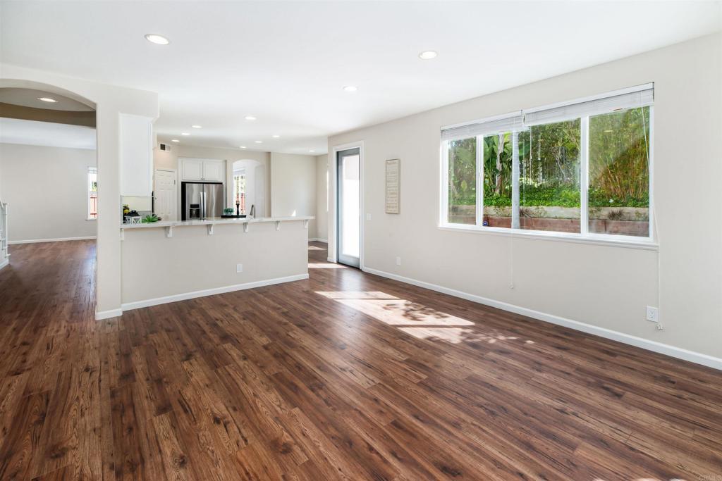 1577 Archer Road San Marcos, CA 92078 - Photo 20 of 53 a view of a kitchen with wooden floor and a window