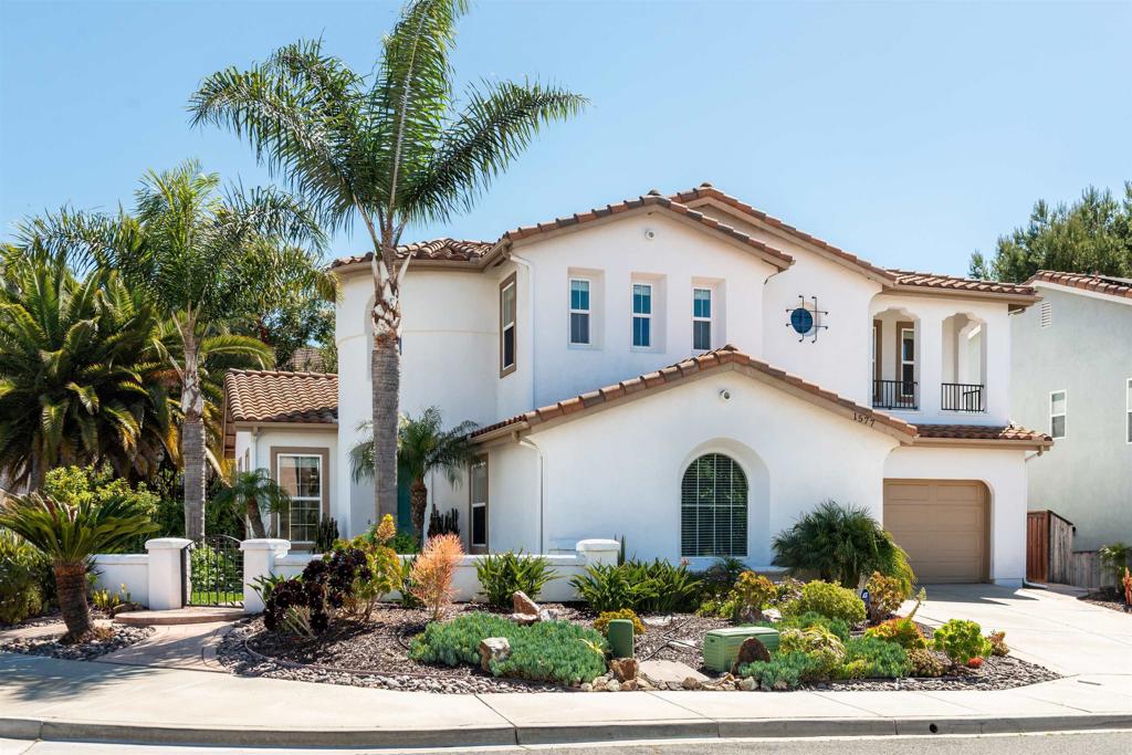 1577 Archer Road San Marcos, CA 92078 - Photo 2 of 53 a view of a house with a yard and plants