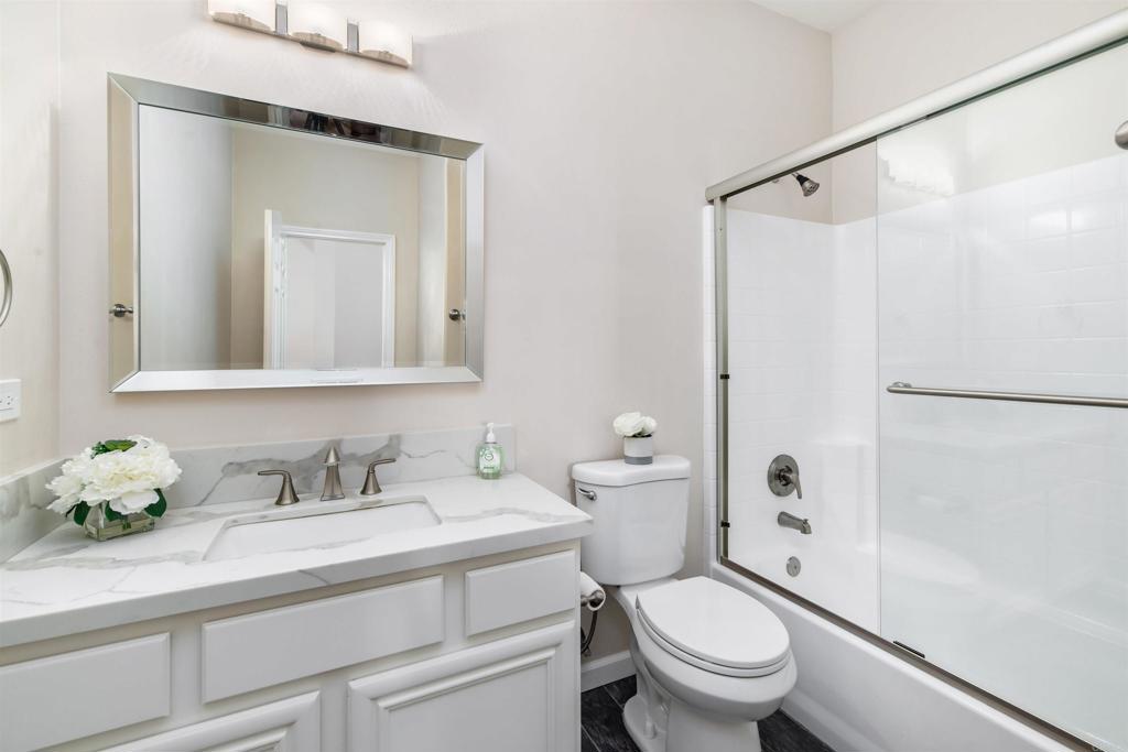1577 Archer Road San Marcos, CA 92078 - Photo 23 of 53 a bathroom with a sink toilet and shower