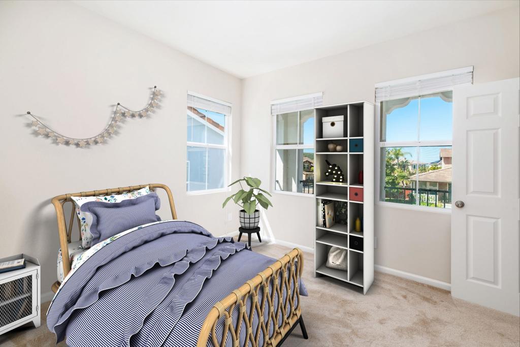 1577 Archer Road San Marcos, CA 92078 - Photo 34 of 53 a living room with furniture and a book shelf