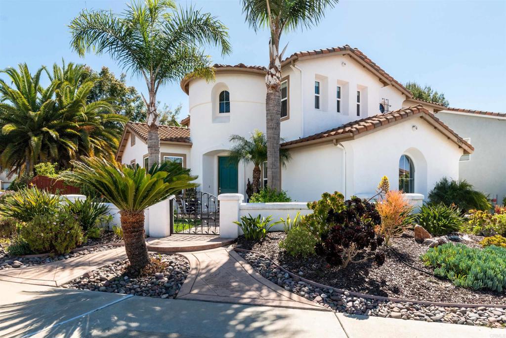 1577 Archer Road San Marcos, CA 92078 - Photo 4 of 53 a front view of house with yard and green space