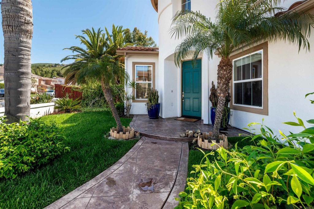 1577 Archer Road San Marcos, CA 92078 - Photo 5 of 53 a front view of a house with garden