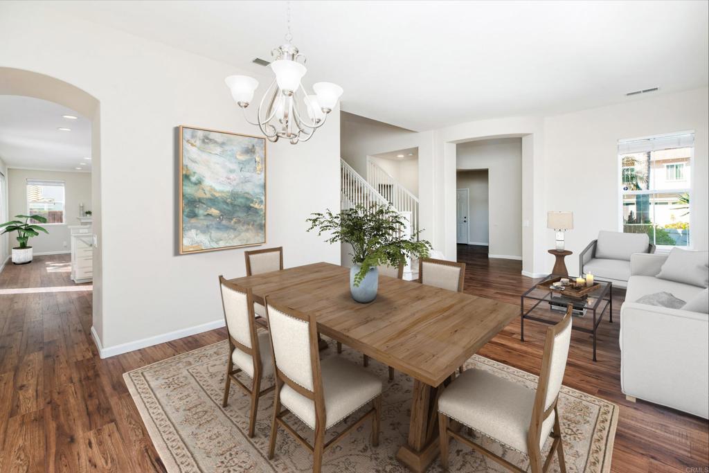 1577 Archer Road San Marcos, CA 92078 - Photo 10 of 53 a view of a dining room with furniture and wooden floor