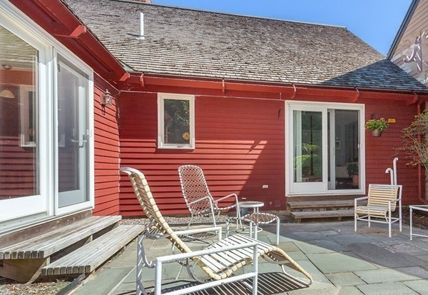 3 Potter Pond, Unit 3 Lexington, MA 02421 - Photo 17 of 20 a front view of a house with a patio