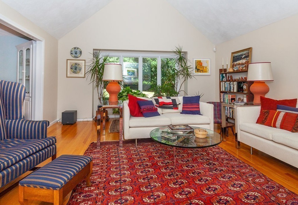 3 Potter Pond, Unit 3 Lexington, MA 02421 - Photo 7 of 20 a living room with furniture and a rug