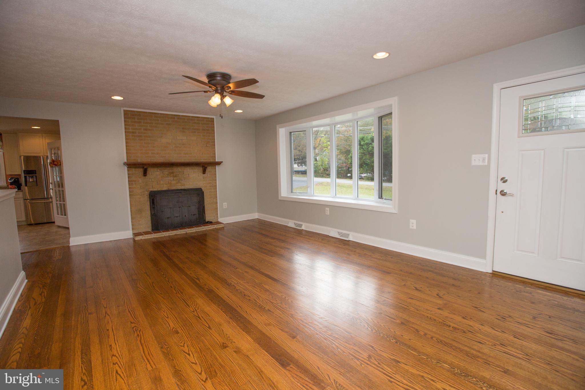 44441 Clarkes Landing Road Hollywood, MD 20636 - Photo 13 of 37 Living Room w/ Fireplace 2