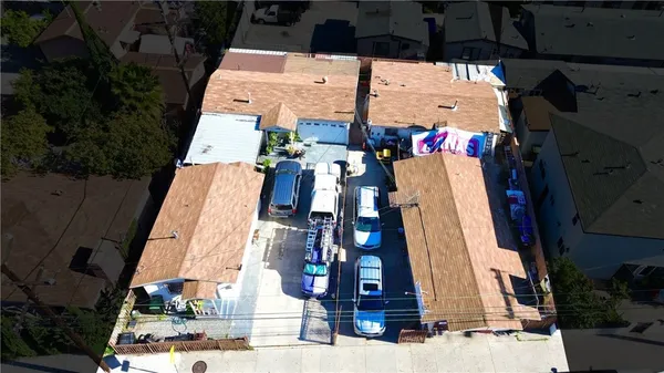 an aerial view of residential house with outdoor space