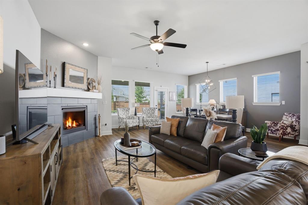 1632 Cotton Road Van Alstyne, TX 75495 - Photo 5 of 40 a living room with furniture and a fireplace