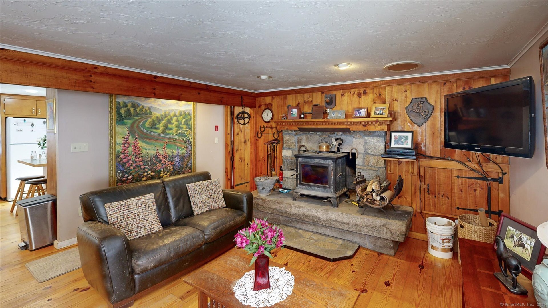 69 North Bedlam Road Chaplin, CT 06235 - Photo 13 of 40 a living room with furniture and a flat screen tv