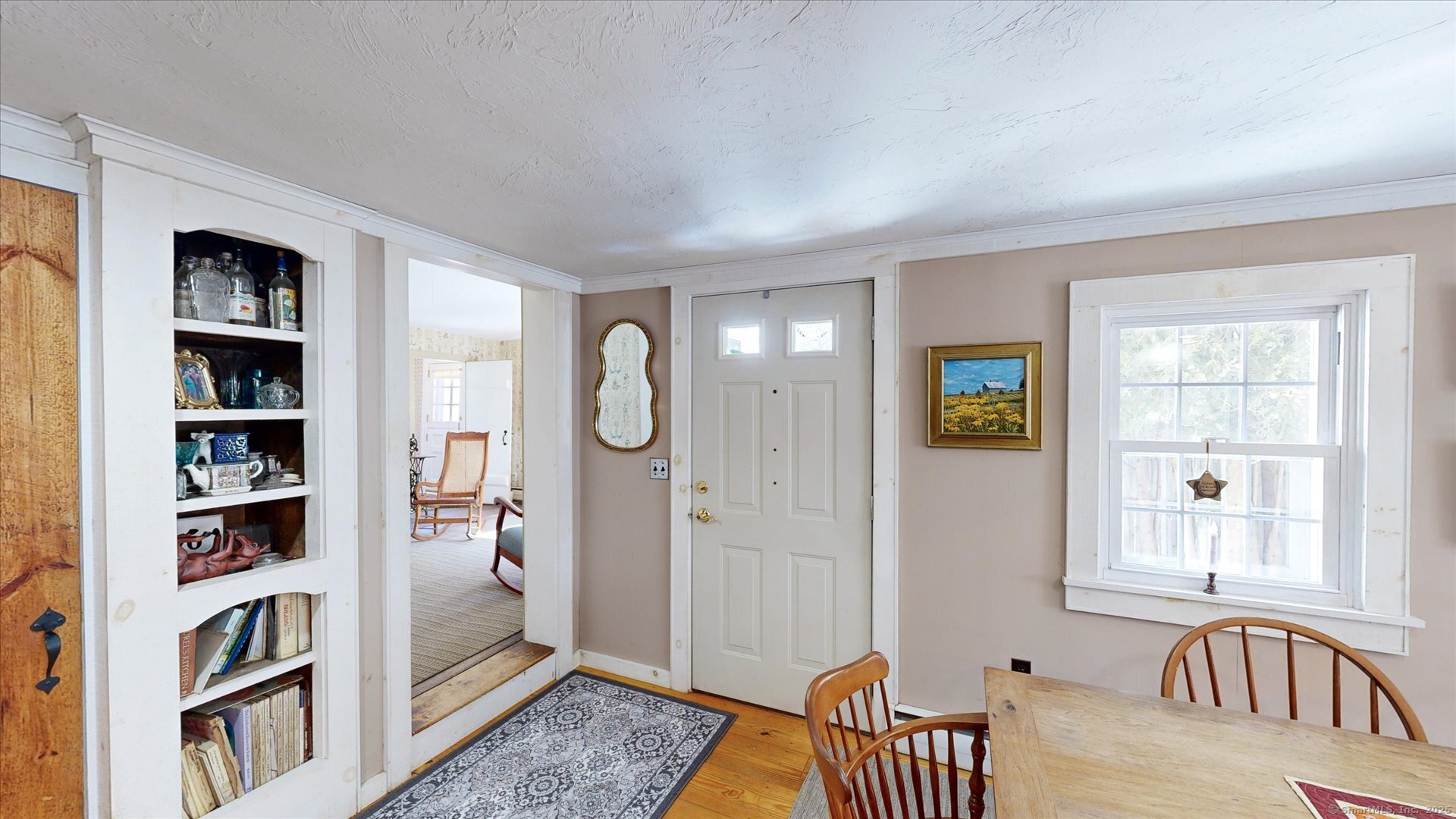 69 North Bedlam Road Chaplin, CT 06235 - Photo 17 of 40 a view of a livingroom with furniture and staircase