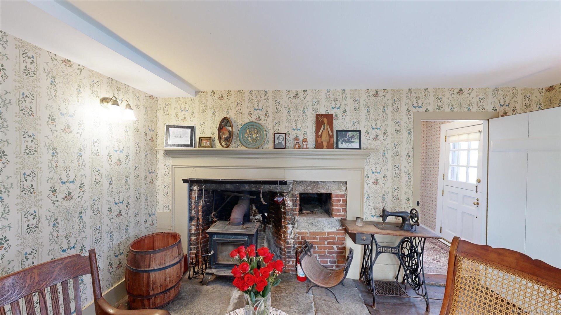 69 North Bedlam Road Chaplin, CT 06235 - Photo 18 of 40 a living room with furniture and a fireplace