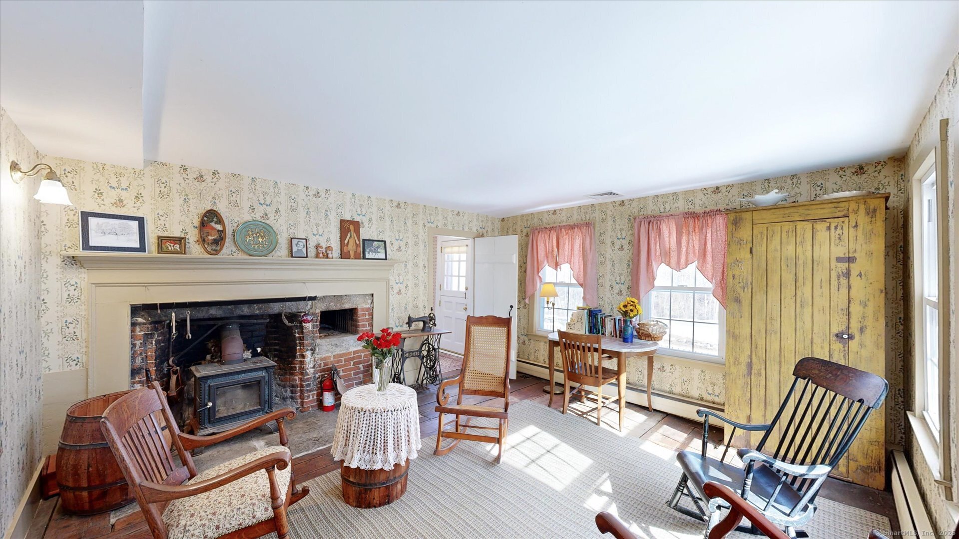 69 North Bedlam Road Chaplin, CT 06235 - Photo 19 of 40 a living room with furniture and a fireplace