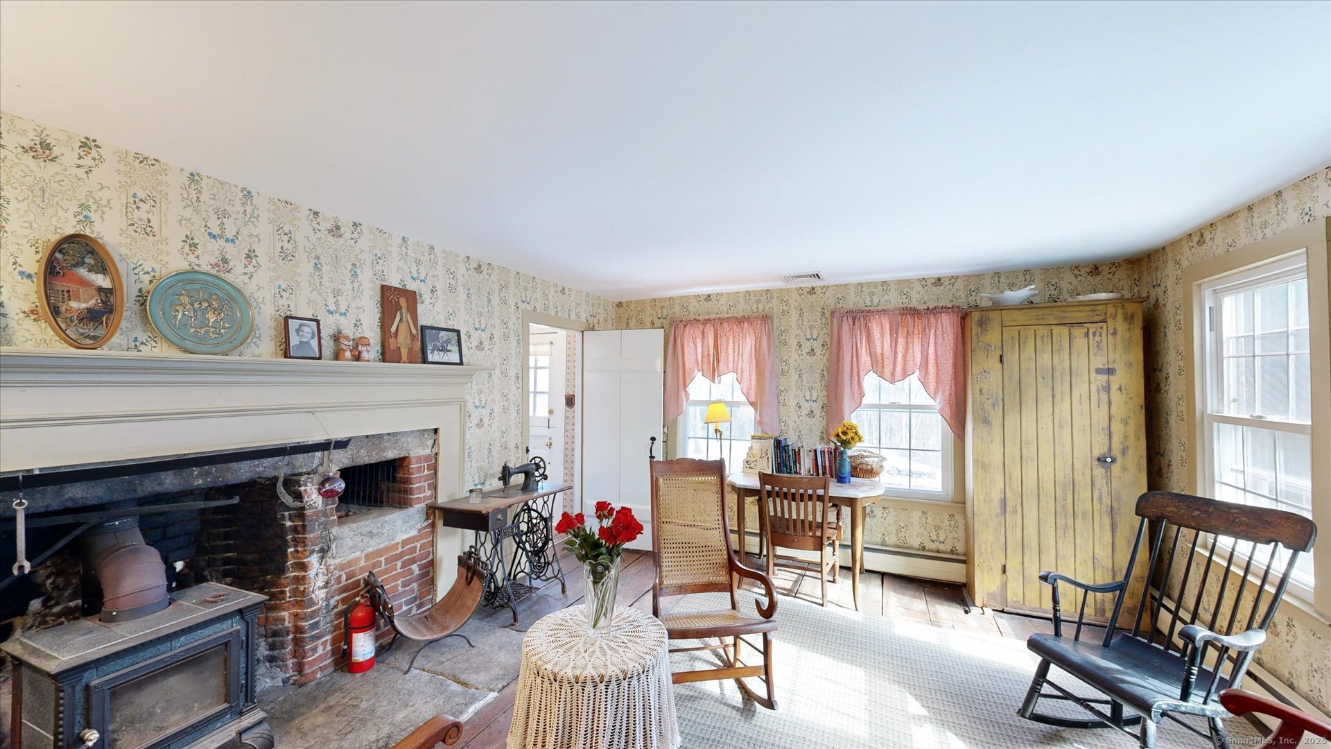 69 North Bedlam Road Chaplin, CT 06235 - Photo 22 of 40 a living room with furniture and a fireplace