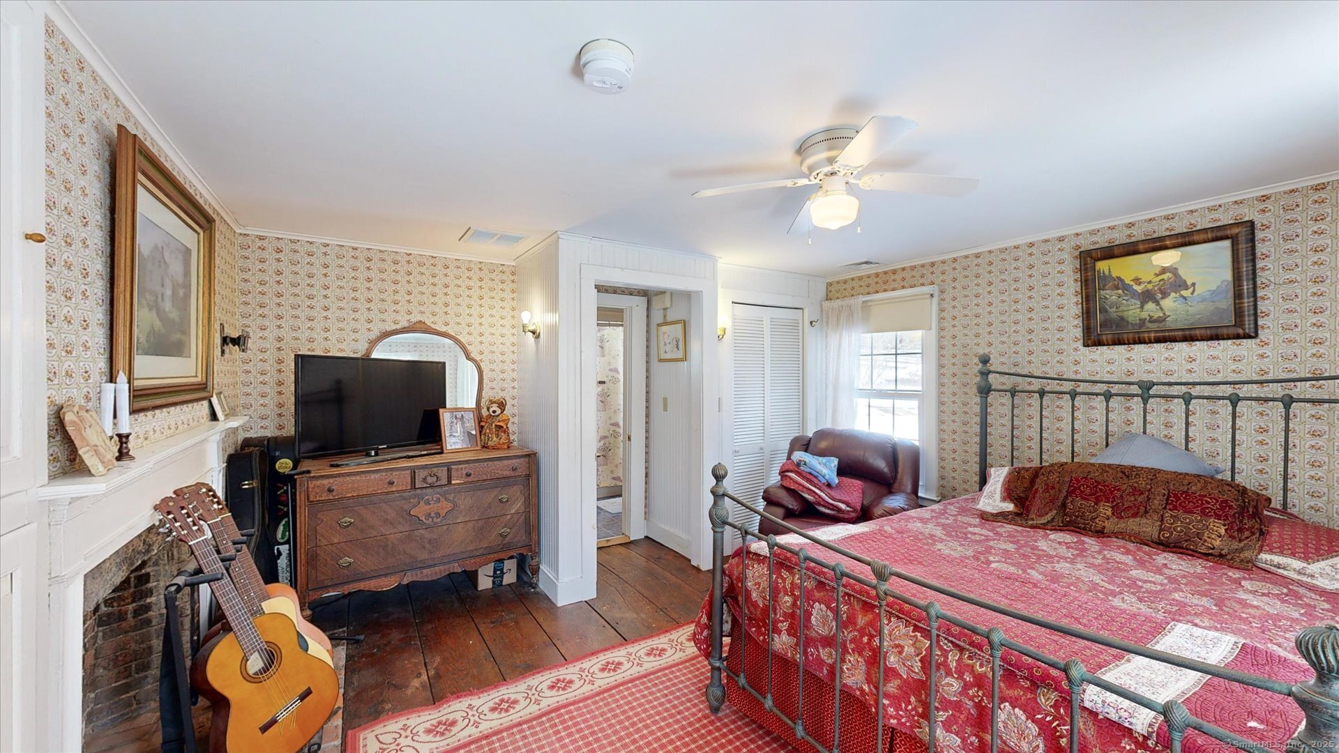 69 North Bedlam Road Chaplin, CT 06235 - Photo 23 of 40 a bedroom with a bed and wooden floor