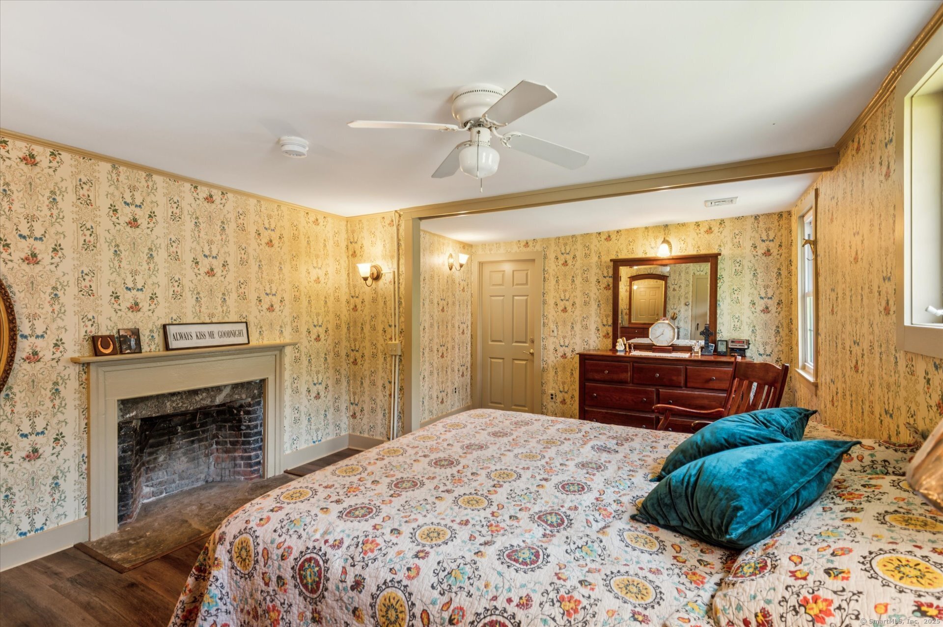 69 North Bedlam Road Chaplin, CT 06235 - Photo 28 of 40 a bedroom with a bed dresser and a wooden floor