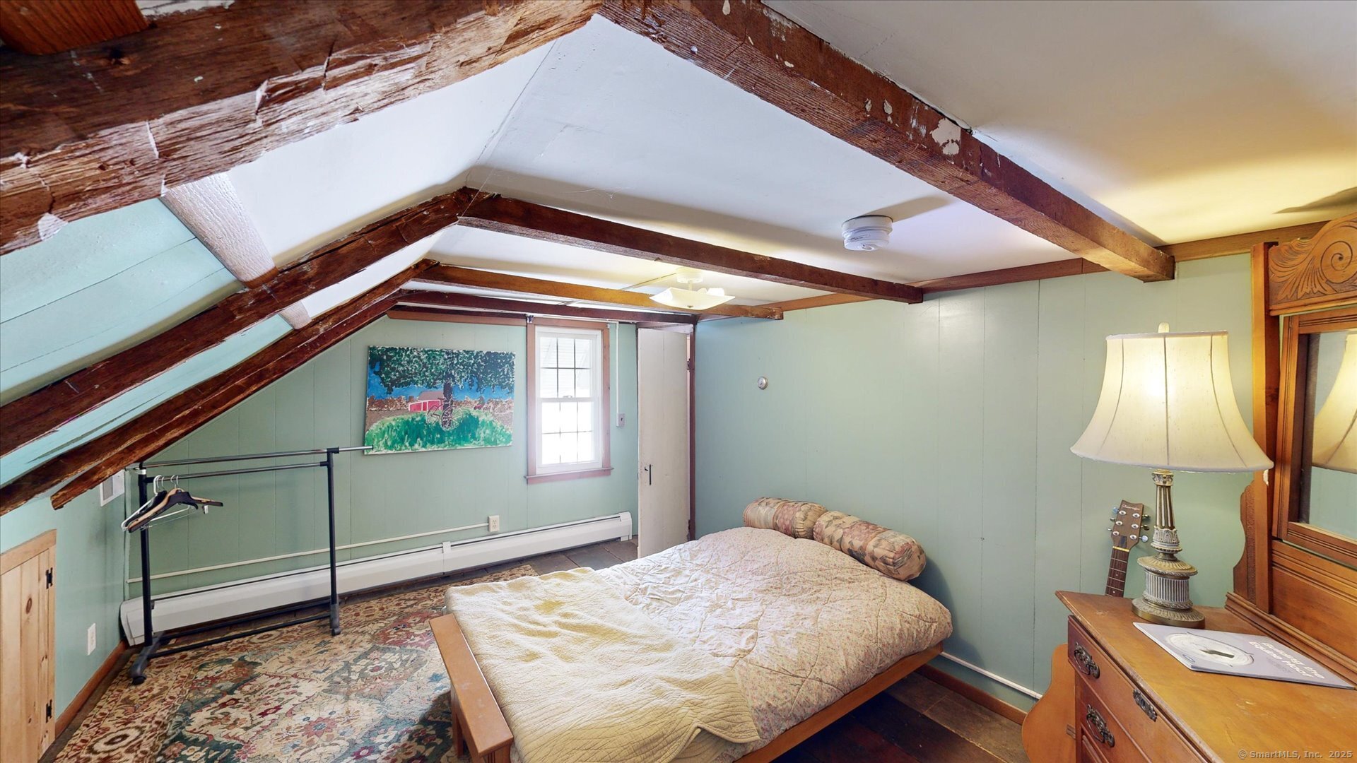 69 North Bedlam Road Chaplin, CT 06235 - Photo 29 of 40 a bedroom with a bed and a window