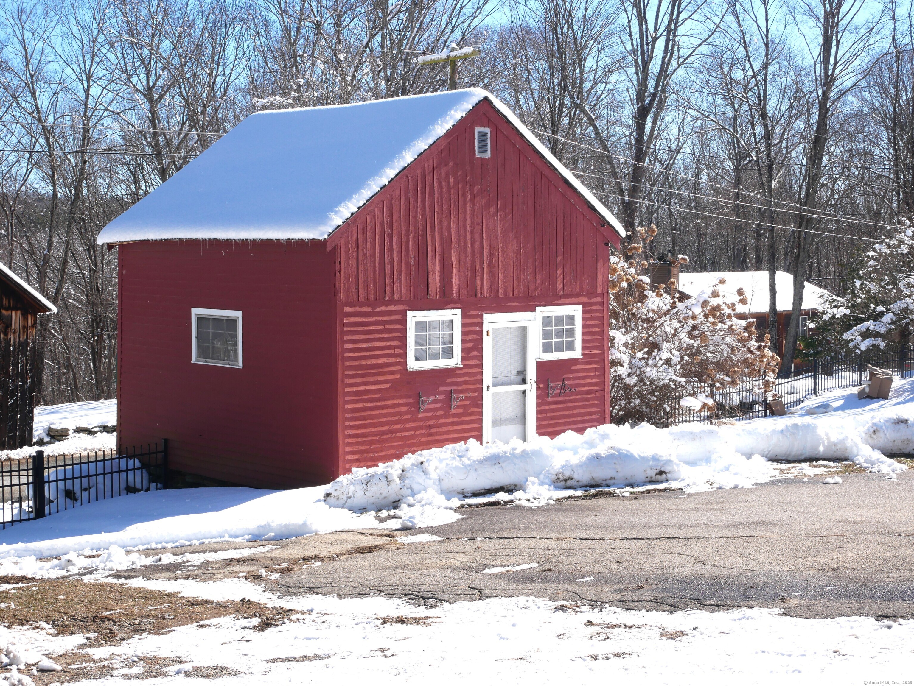 69 North Bedlam Road Chaplin, CT 06235 - Photo 37 of 40 a view of a house with snow on the road