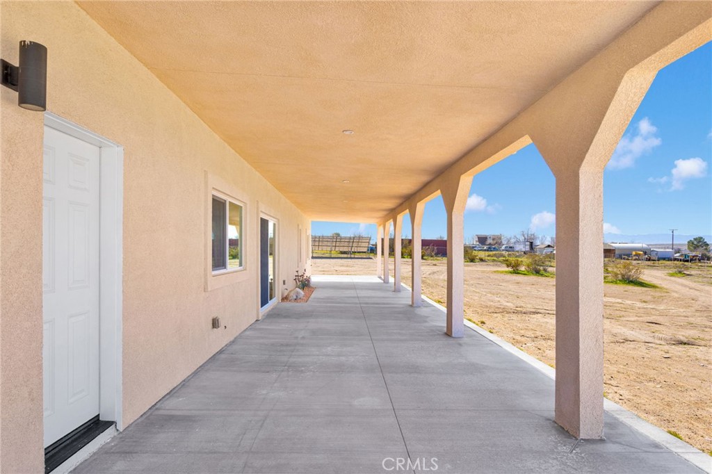 24589 Burngan Avenue Oro Grande, CA 92368 - Photo 49 of 74 Full Length covered/stucco patios