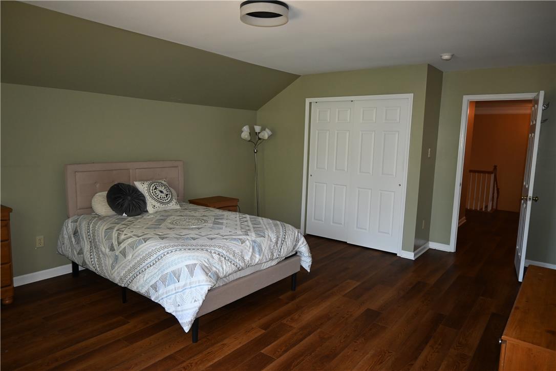 3829 East Hopewell Road Center Valley, PA 18034 - Photo 41 of 52 Rich wood flooring grounds this well-lit bedroom featuring a convenient closet.
