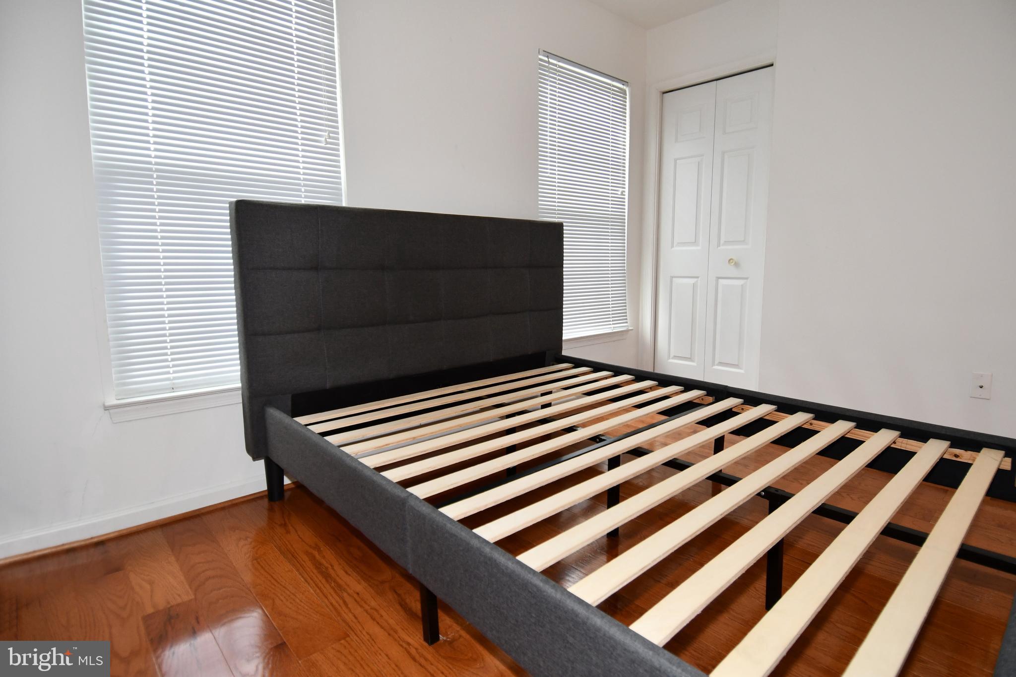 6410 Andrew Matthew Terrace Springfield, VA 22150 - Photo 21 of 31 a bedroom with a bed and a window