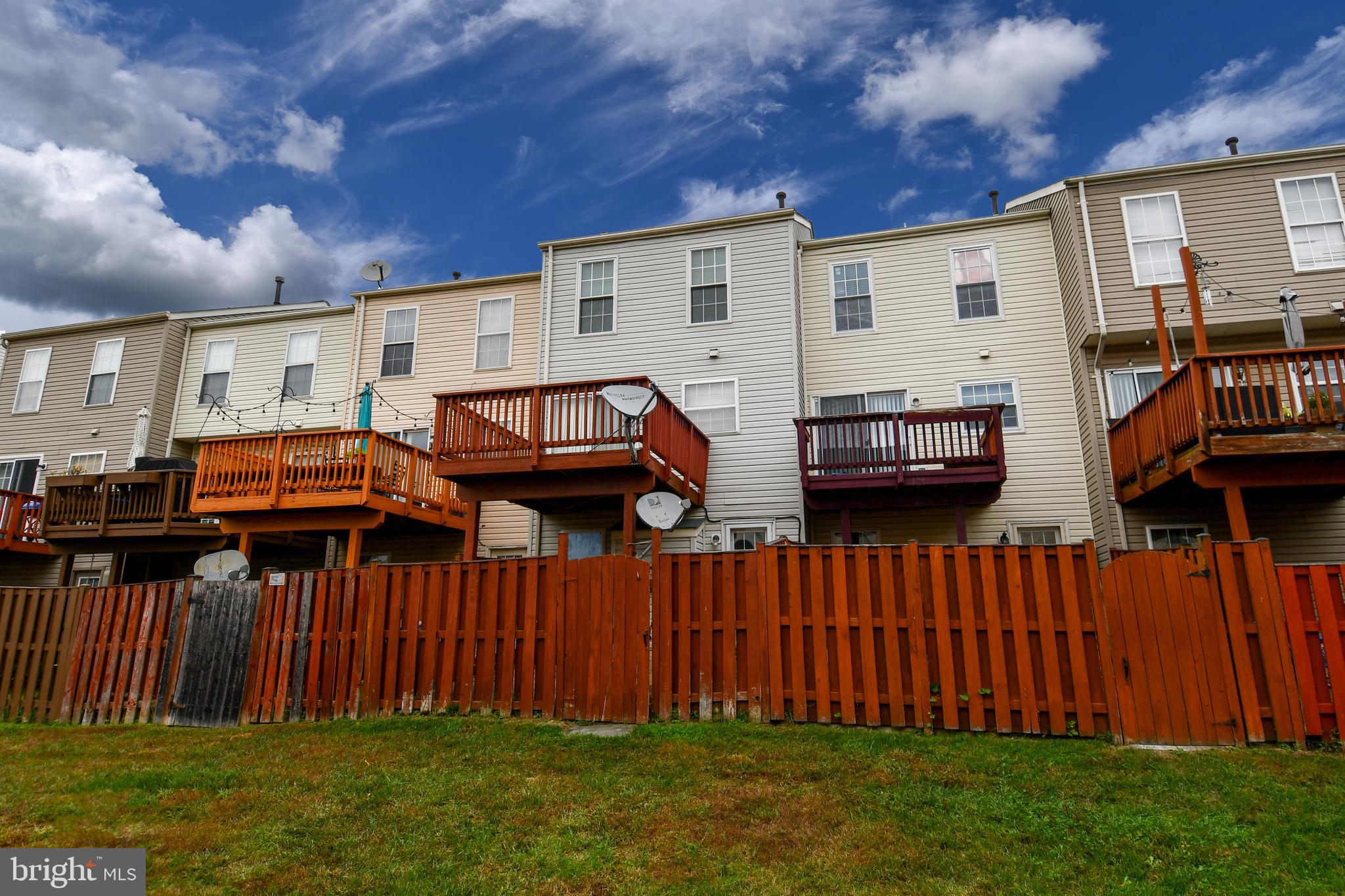 6410 Andrew Matthew Terrace Springfield, VA 22150 - Photo 27 of 31 a view of a house with backyard and sitting area