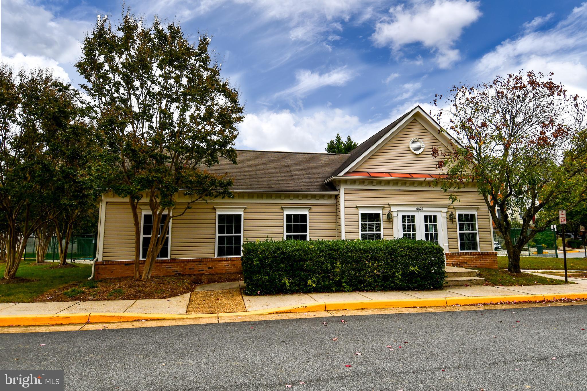 6410 Andrew Matthew Terrace Springfield, VA 22150 - Photo 28 of 31 a front view of a house with a yard