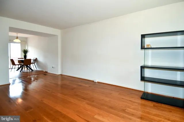 a view of a livingroom with wooden floor