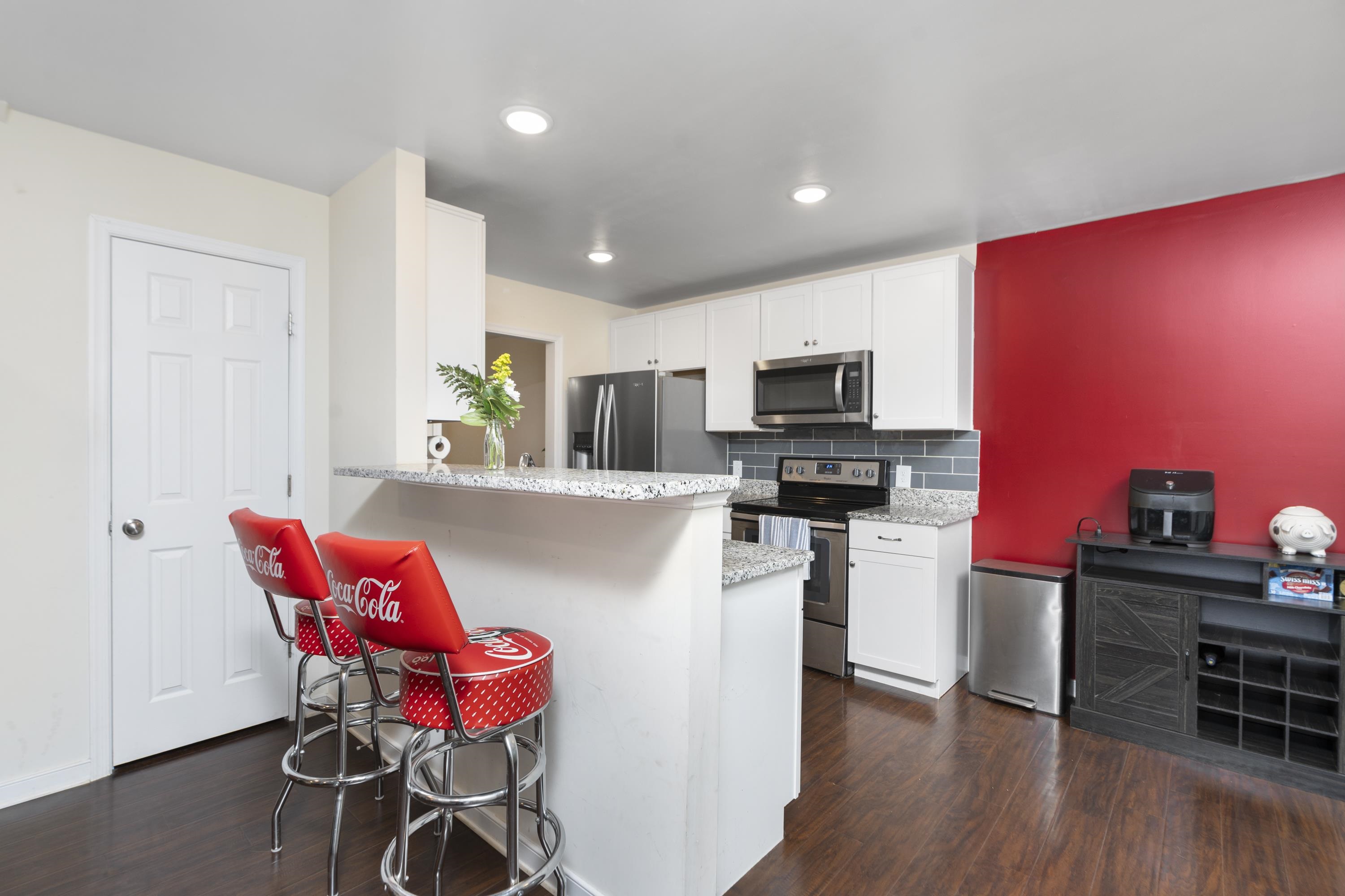 10 Zephyr Road Palmyra, VA 22963 - Photo 13 of 72 a kitchen with stainless steel appliances kitchen island granite countertop a kitchen island hardwood floor and a sink