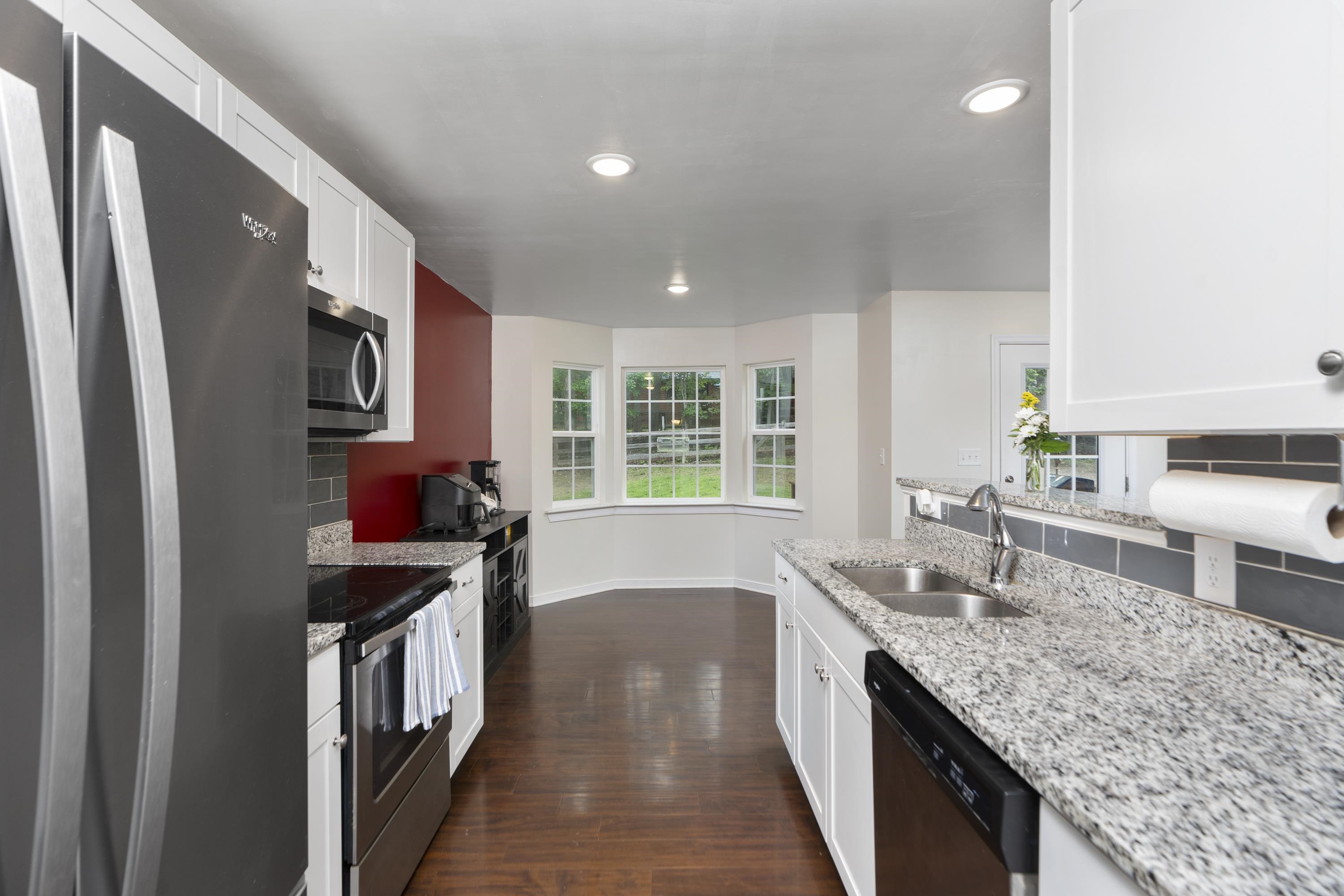 10 Zephyr Road Palmyra, VA 22963 - Photo 22 of 72 a kitchen with stainless steel appliances granite countertop a sink stove and refrigerator