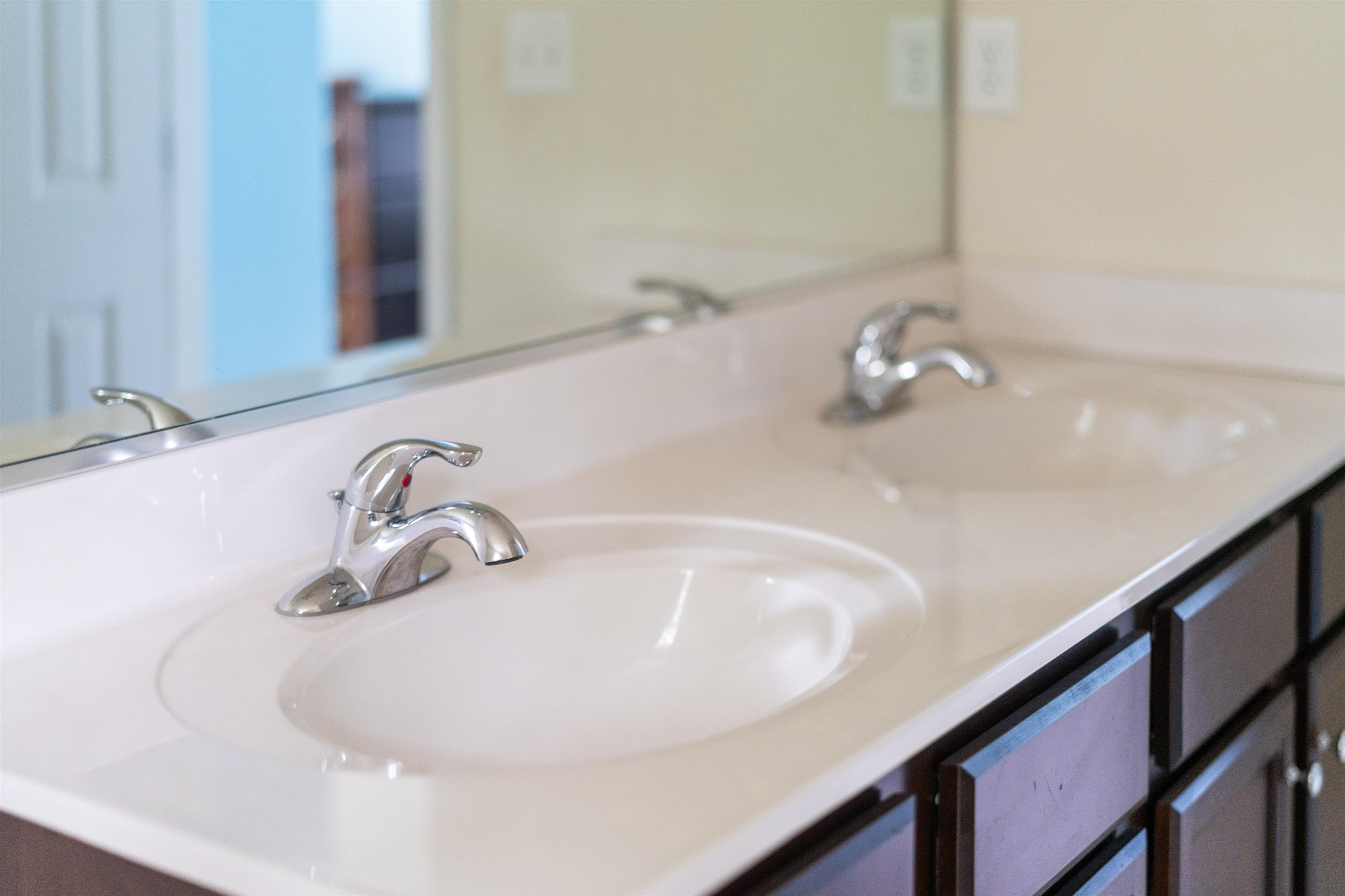 10 Zephyr Road Palmyra, VA 22963 - Photo 36 of 72 a bathroom with a sink and a mirror
