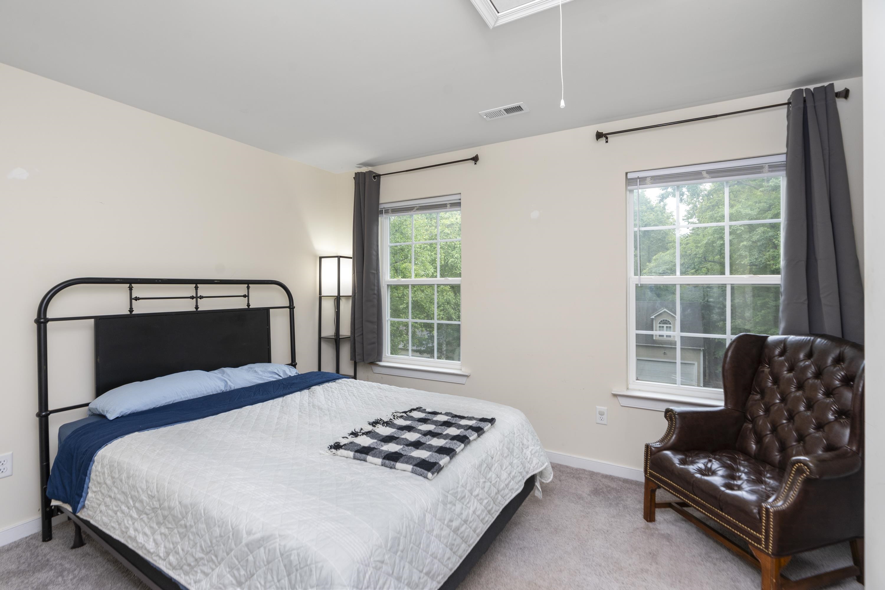 10 Zephyr Road Palmyra, VA 22963 - Photo 39 of 72 a bedroom with a bed couch and window