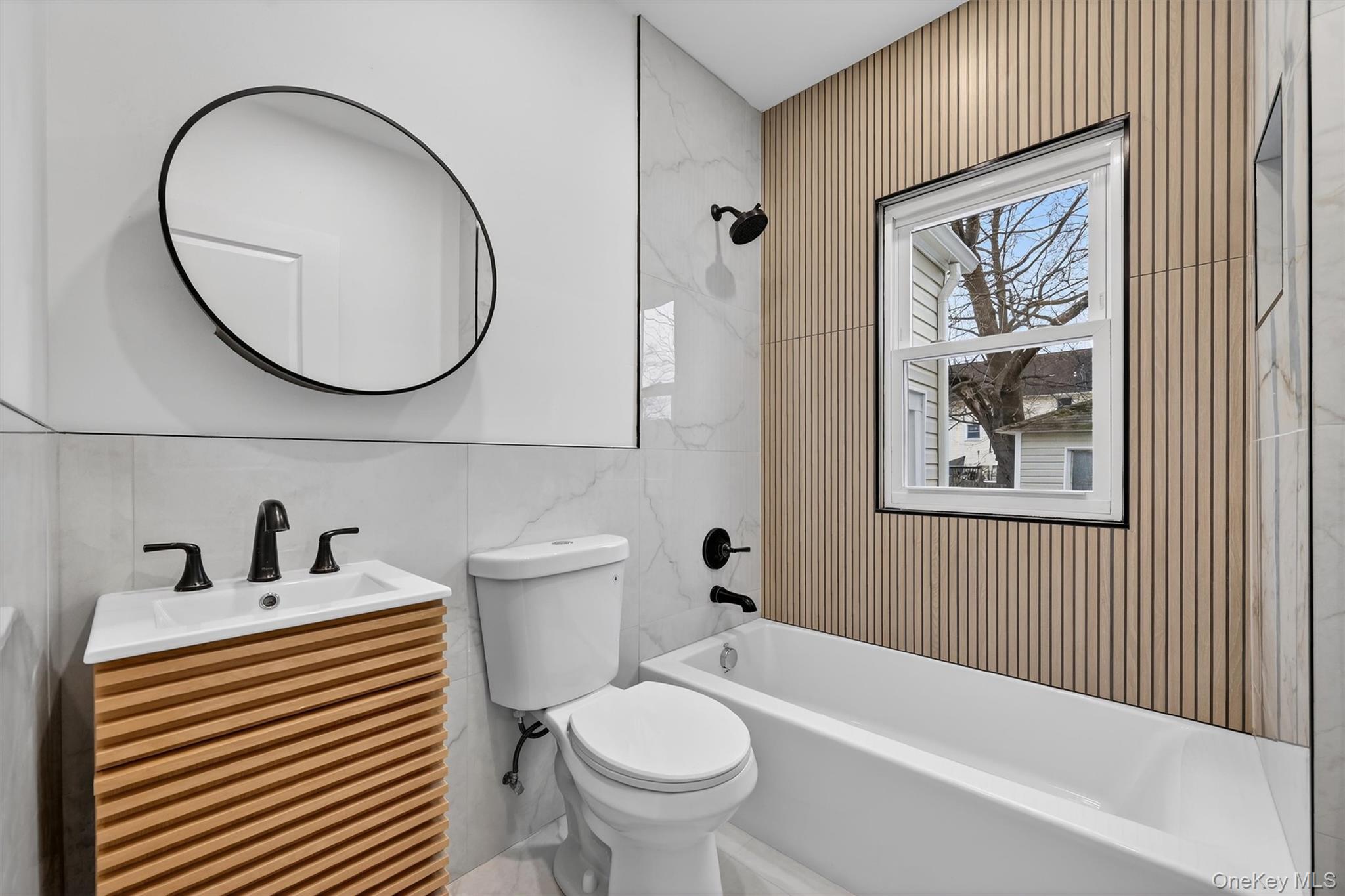 60 Jeanibo Road Monroe, NY 10950 - Photo 12 of 17 a bathroom with a toilet a sink and a mirror