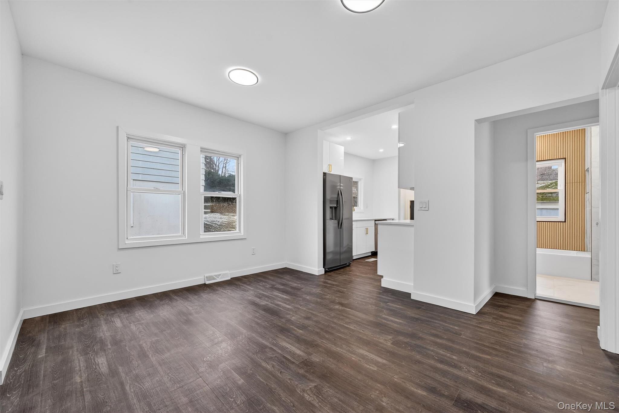 60 Jeanibo Road Monroe, NY 10950 - Photo 7 of 17 a view of empty room with wooden floor and window