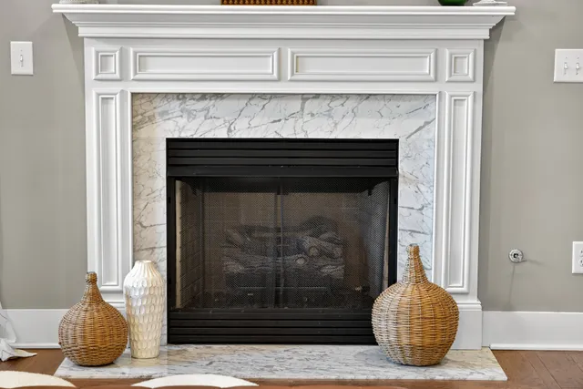 a spacious bedroom with a bed and window