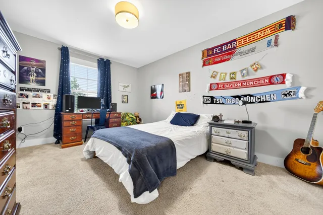 a bathroom with a sink double vanity granite and a bathtub