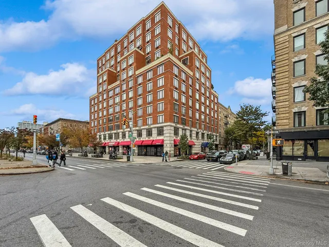 a view of a building with a street
